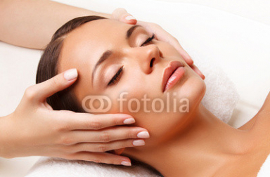 Face_Massage.__Close-up_of_a_Young_Woman_Getting_Spa_Treatment..jpg